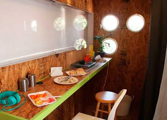 To make use of natural light during the day, several small windows have been built into the walls, and one side of the home is made of transparent material fitted with a curtain