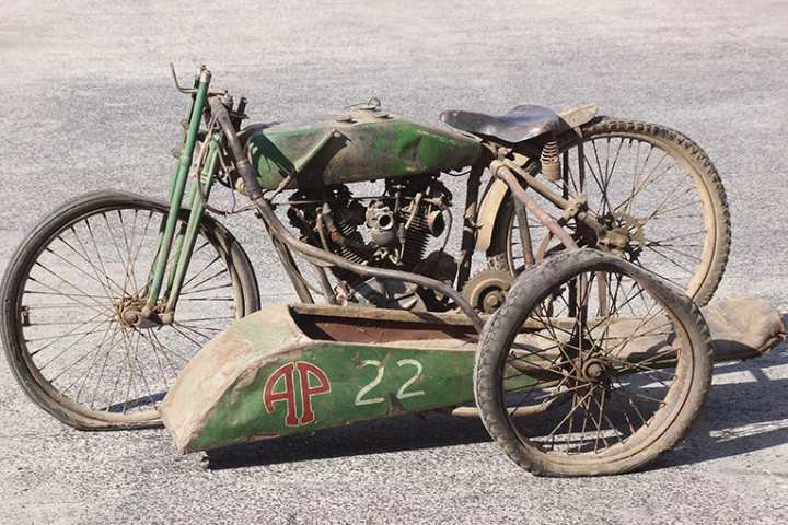 A circa-1927 FHA 8-Valve V-Twin racer, complete with sidecar, has made motorcycle auction history in Australia
