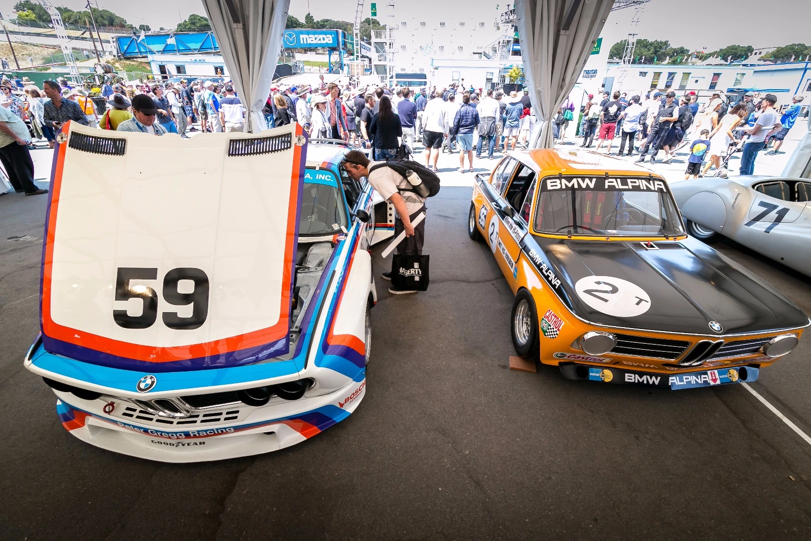 Race-bred early 70s era BMW 2002 Tii on the right with 3.0 CSL left