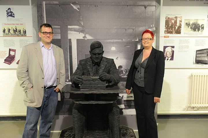 Google's Simon Meacham and Dr Sue Black on either side of Enigma genius Alan Turing (Photo: Google)