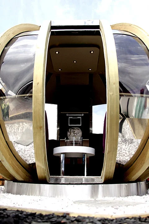 The G-POD series features rotating or fixed spheres that create a practical outdoor living addition