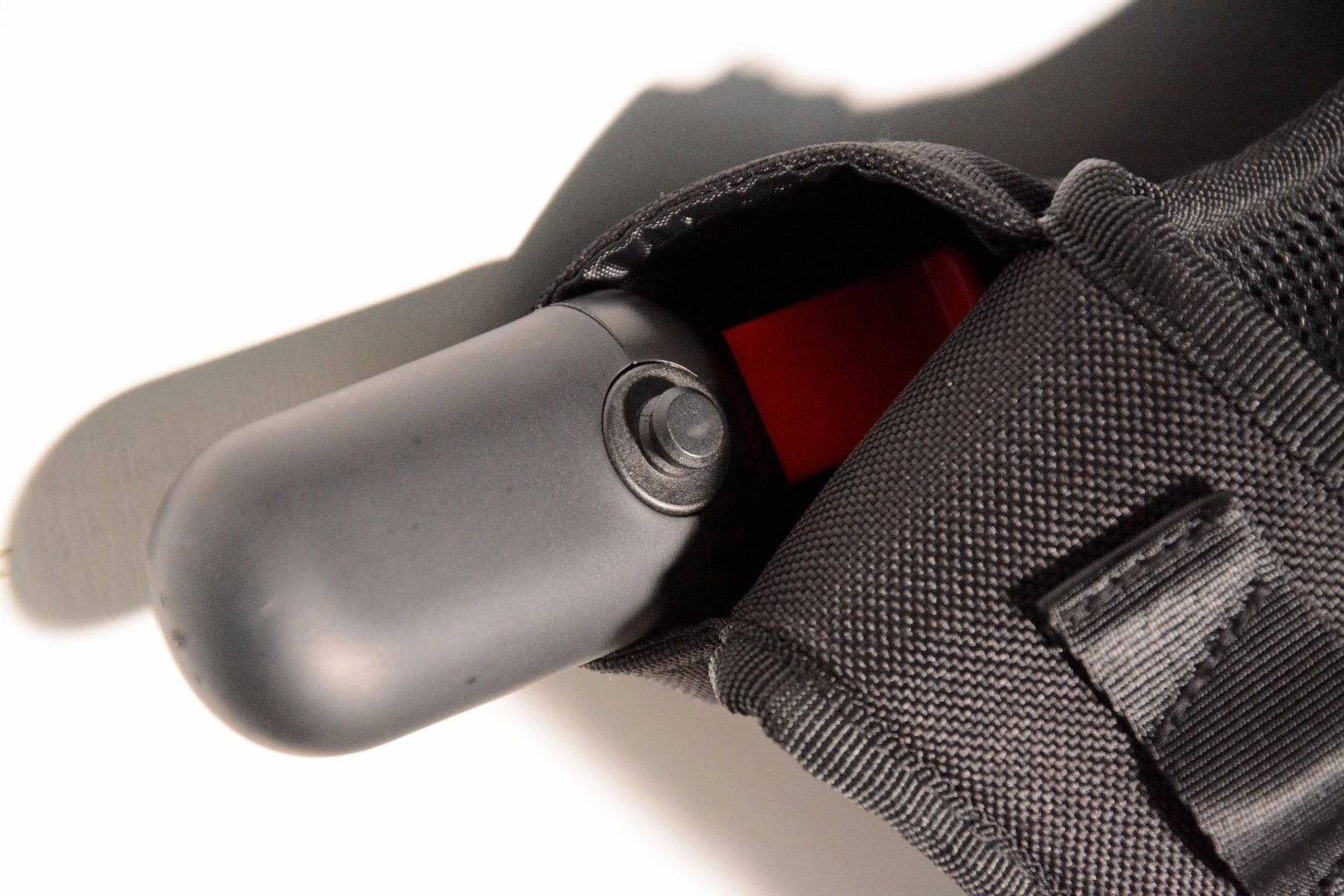 When the ergonomic handle is placed in the fabric receiver, the lock mechanism is reset