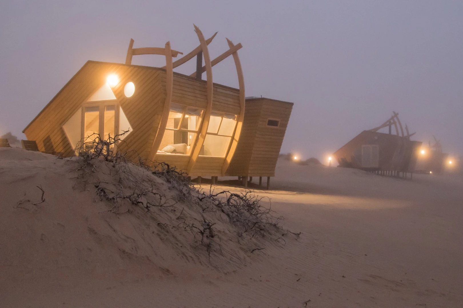 Inside the cabins at Namibia's Shipwreck Lodge, guests find a wood burner stove and an ensuite