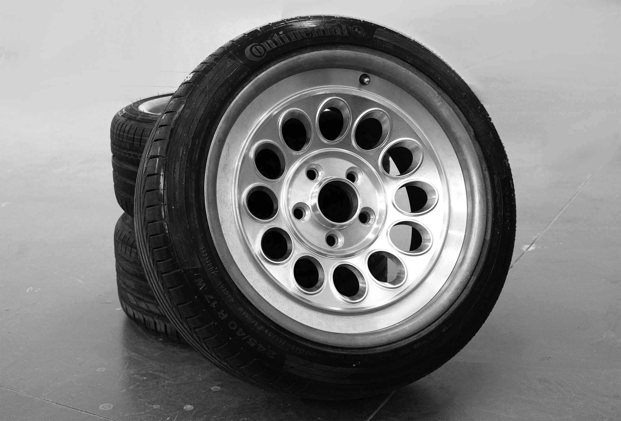 The period-inspired aluminum forged wheels are shod in Continental ContiSportContact tires