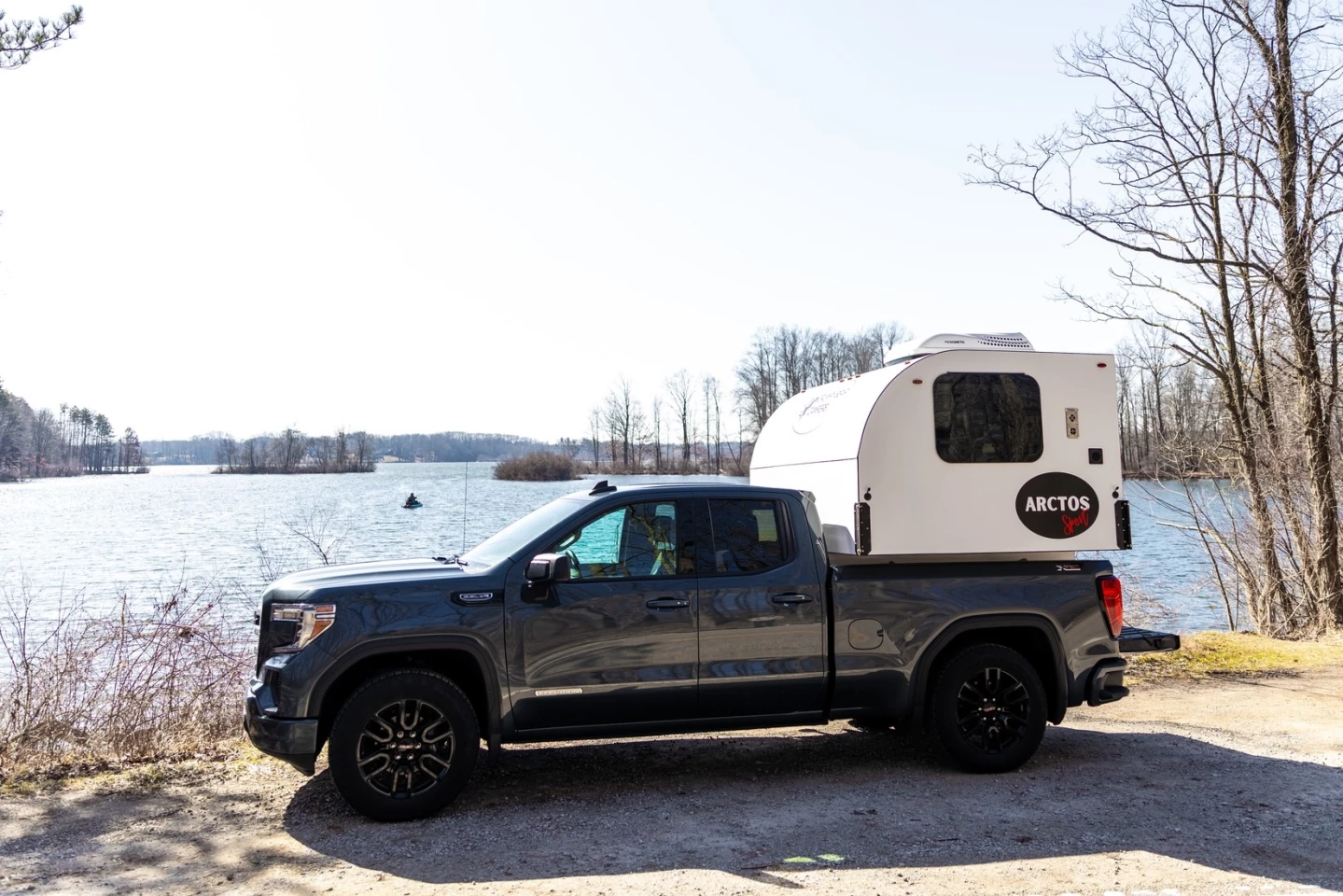 From the side, the Arctos Sport looks like a small 6.5-foot-long teardrop body riding aboard a pickup bed