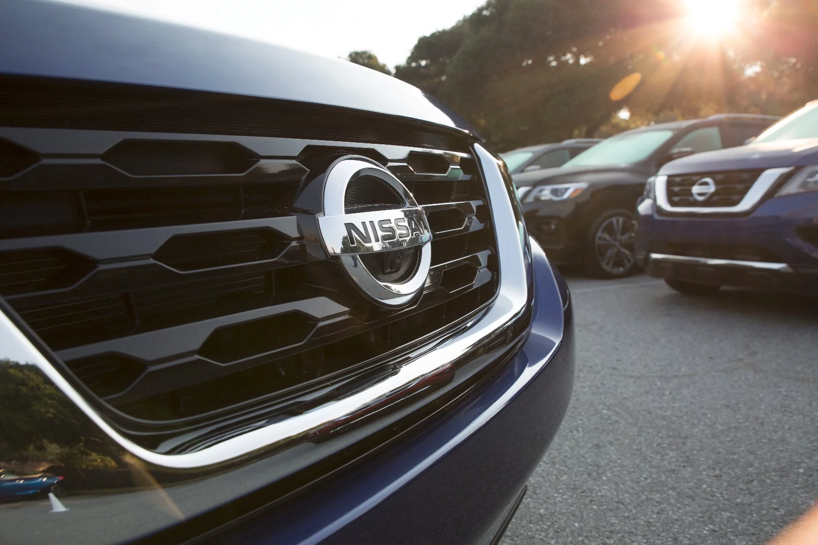 The front grille now carries a more pronounced version of Nissan’s “V-motion” design with lines beneath and to the sides to create blank space to accent the look and make the grille appear larger
