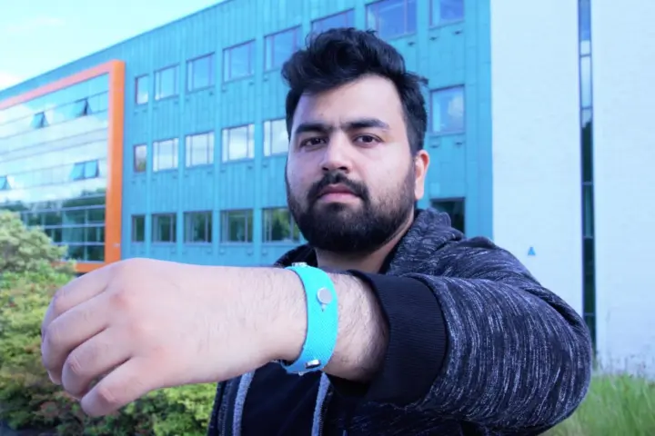 Co-creator Muhammad Umair wearing one of the prototype wristbands