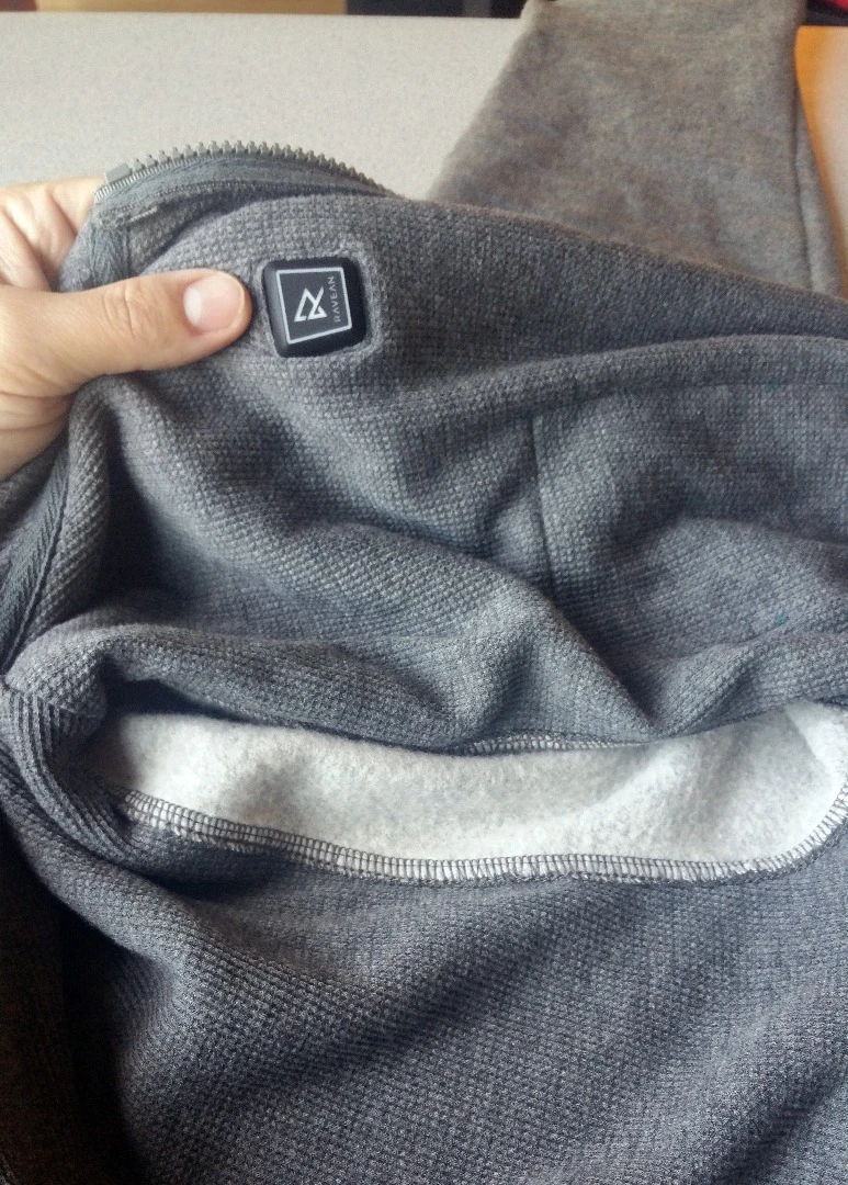 The power button to activate the heating elements is located on the inside, left of the main zipper
