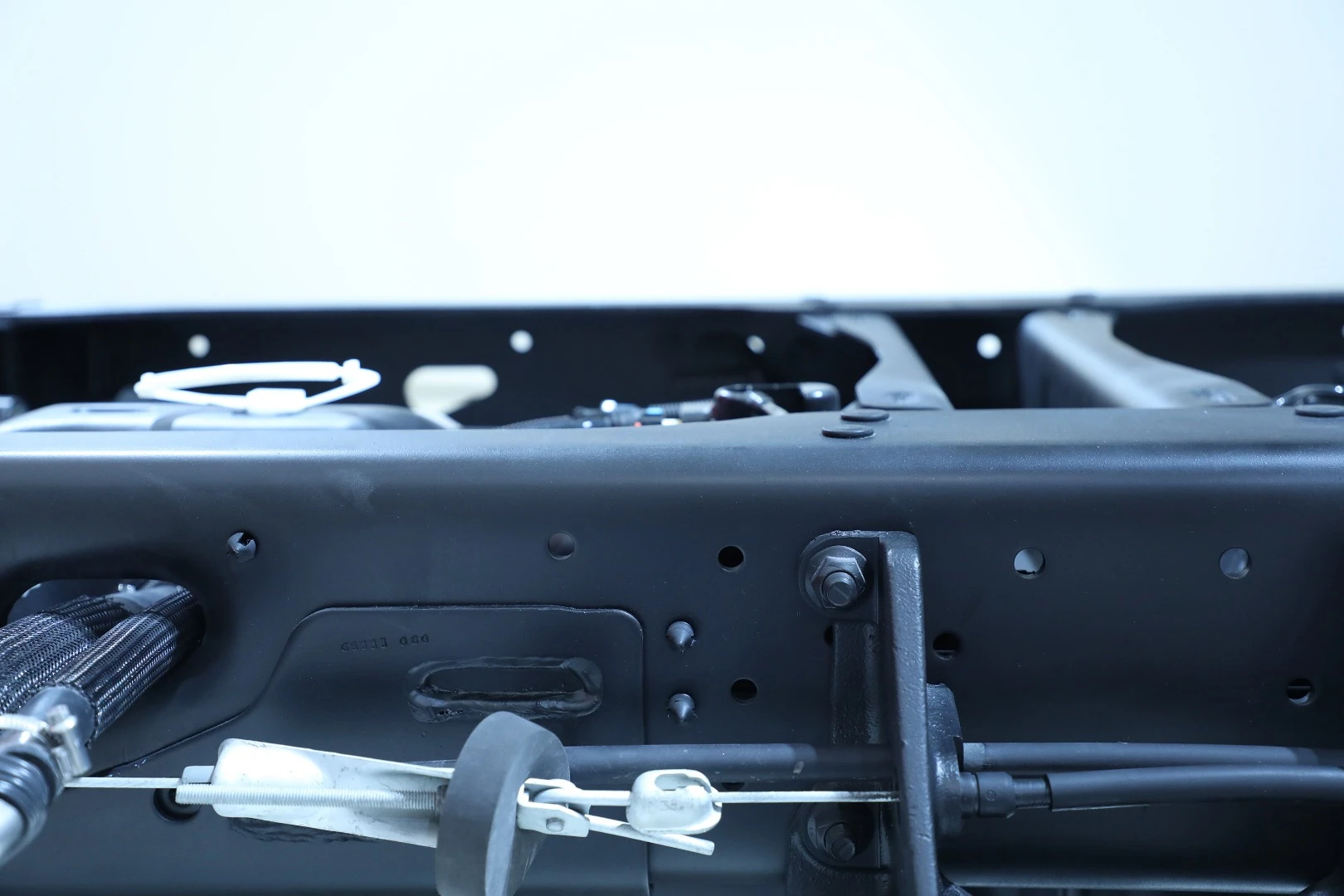 All of the truck’s components behind the cab are kept below the top of the frame rails in order to make installing specialty equipment atop the chassis simpler