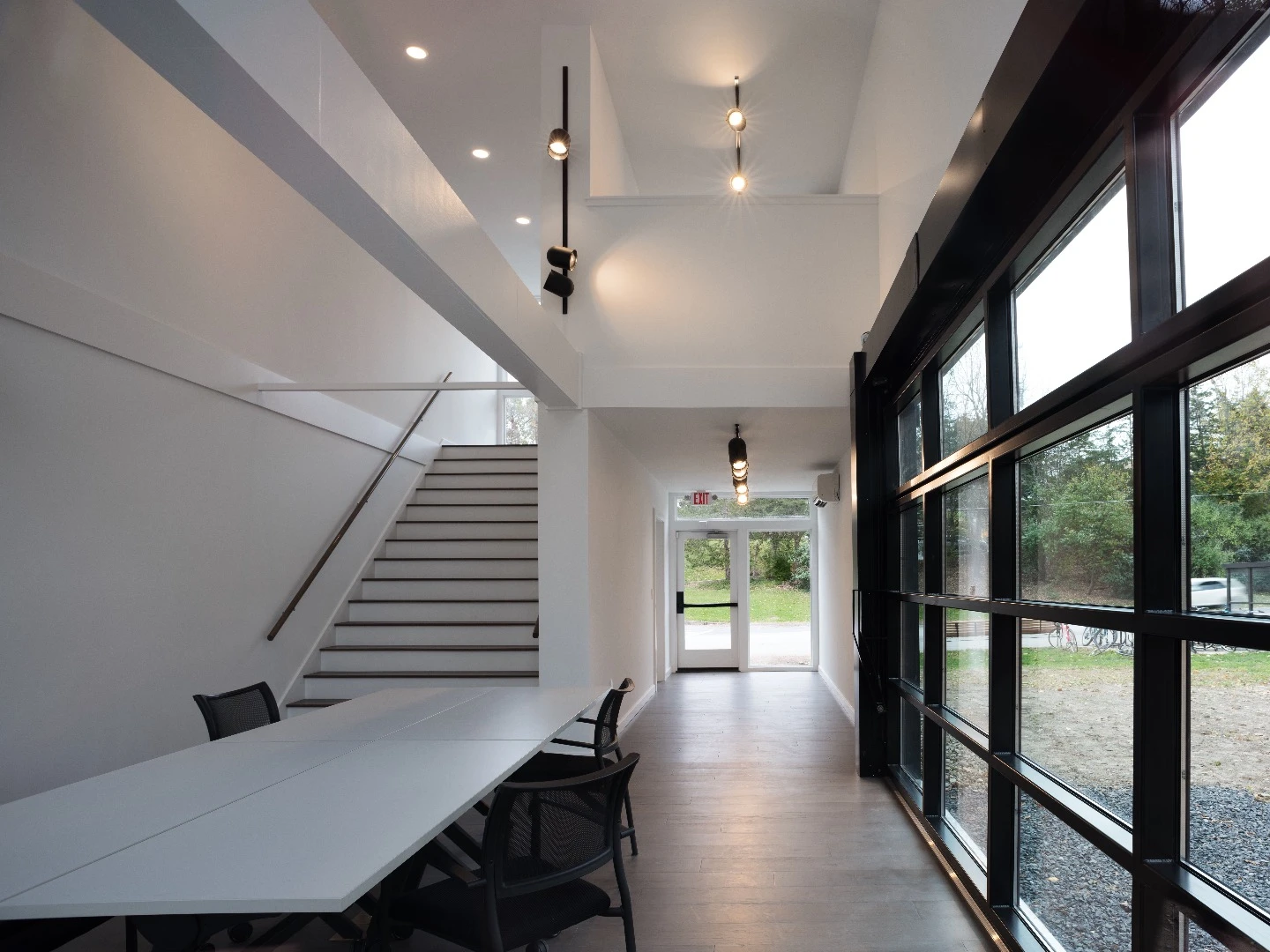The Bard Media Lab consists of four recycled shipping containers painted black and stacked in a two up, two down configuration