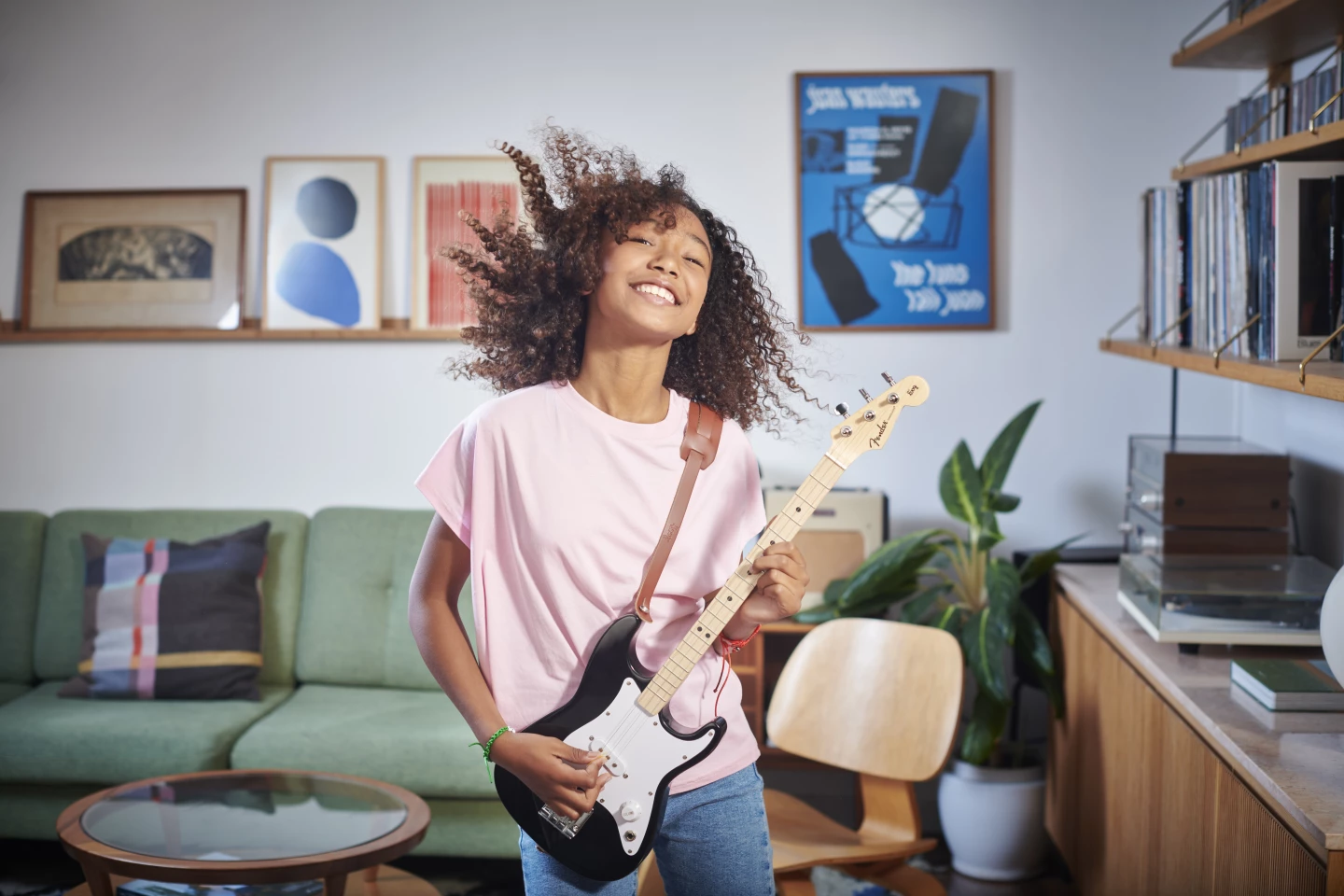 The triad chord shapes learned on the Fender x Loog Strat could easily be applied to six-string guitars when the youngster grows into full size models