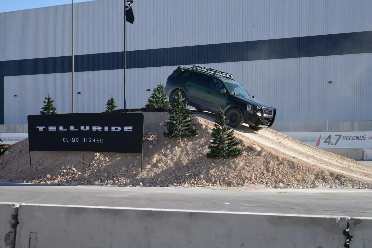 Kia seems quite eager to sell its new full-size Telluride SUV as a rugged, ready-for anything utility vehicle; the model will debut in full next year