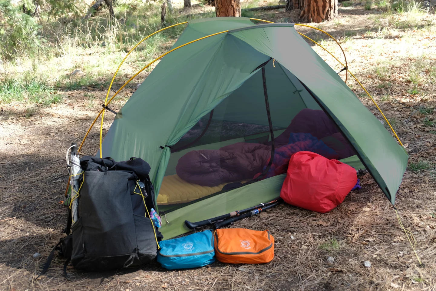 It's a solo tent but features mesh doors and roll-back vestibules on each side