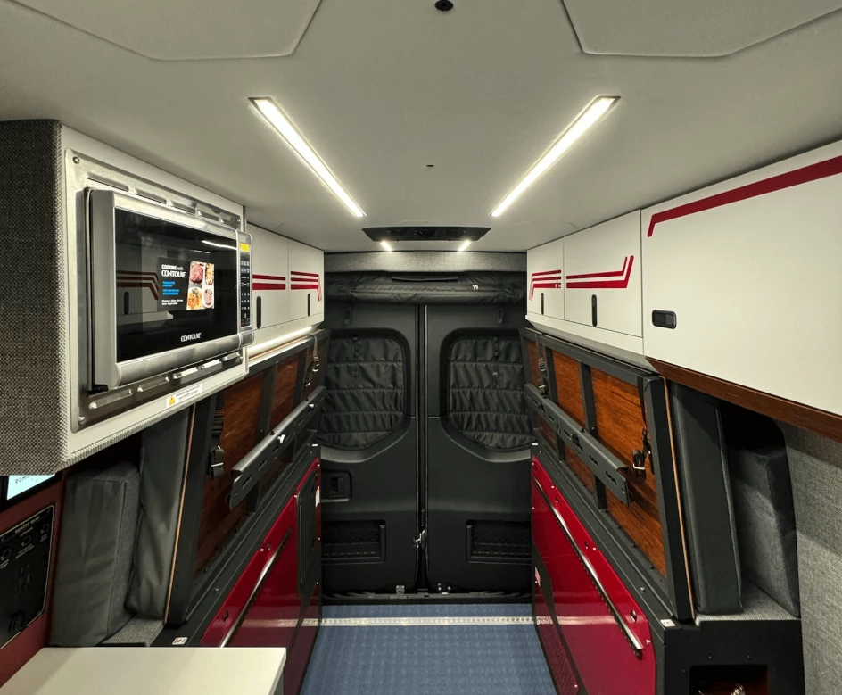 The split-folding bed packs away quite neatly and clears room for bicycles, tall luggage and other large cargo