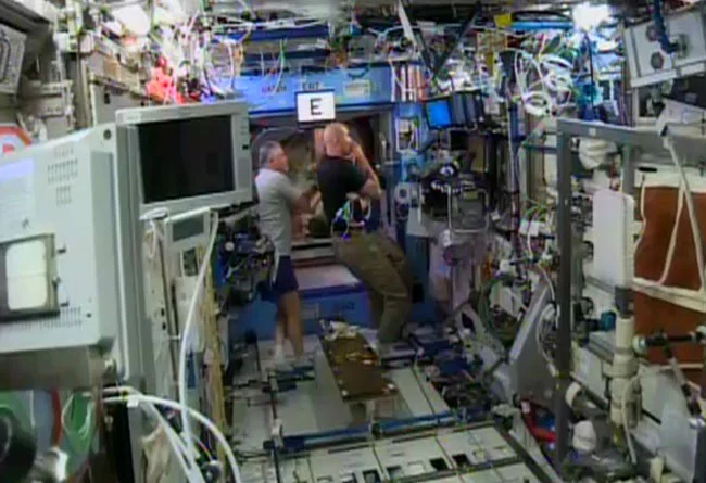 The ISS crew watching the launch of Cygnus (Image: NASA TV)
