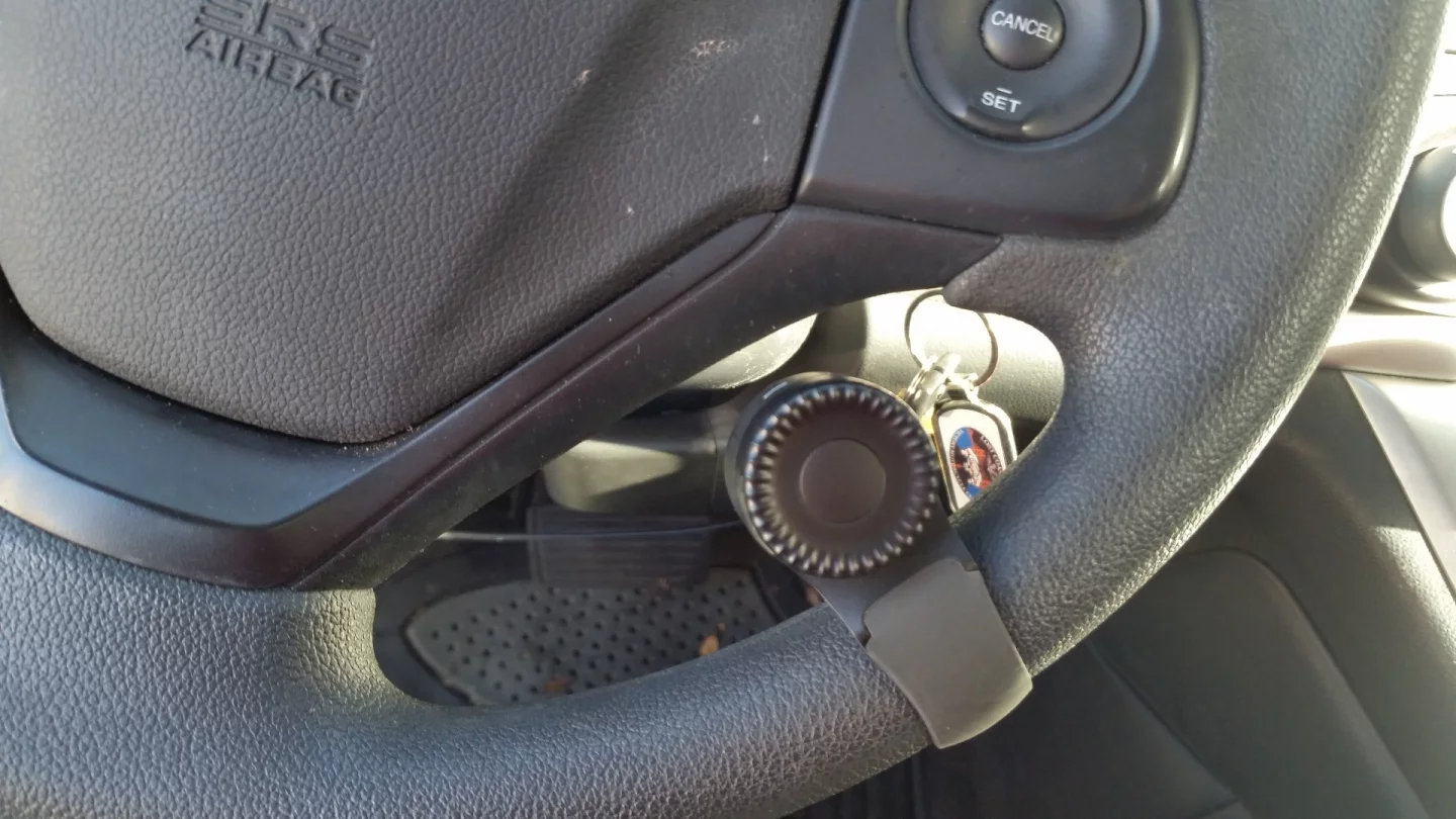 The Navdy head up display comes with a dial that is mounted on the steering wheel and lets you scroll through and choose different menu items