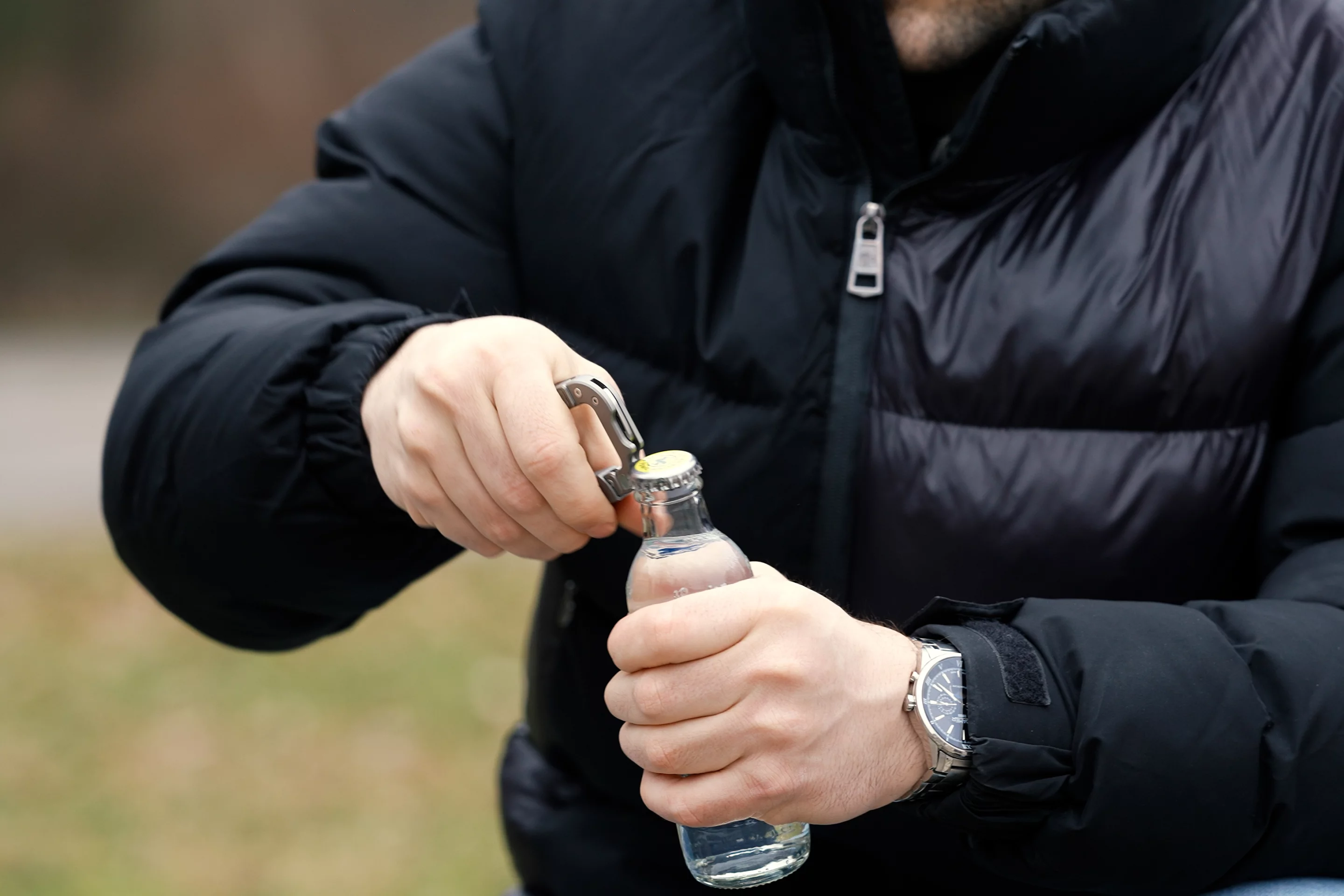 The Octo Mighty's bottle opener in action