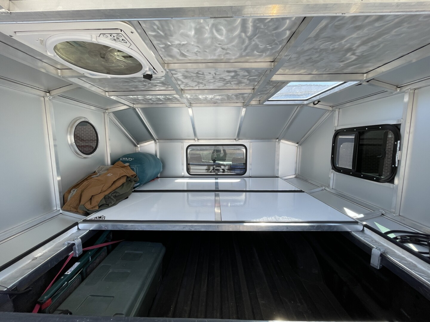 Moonlander truck RV tightropes ingeniously between camper and cap