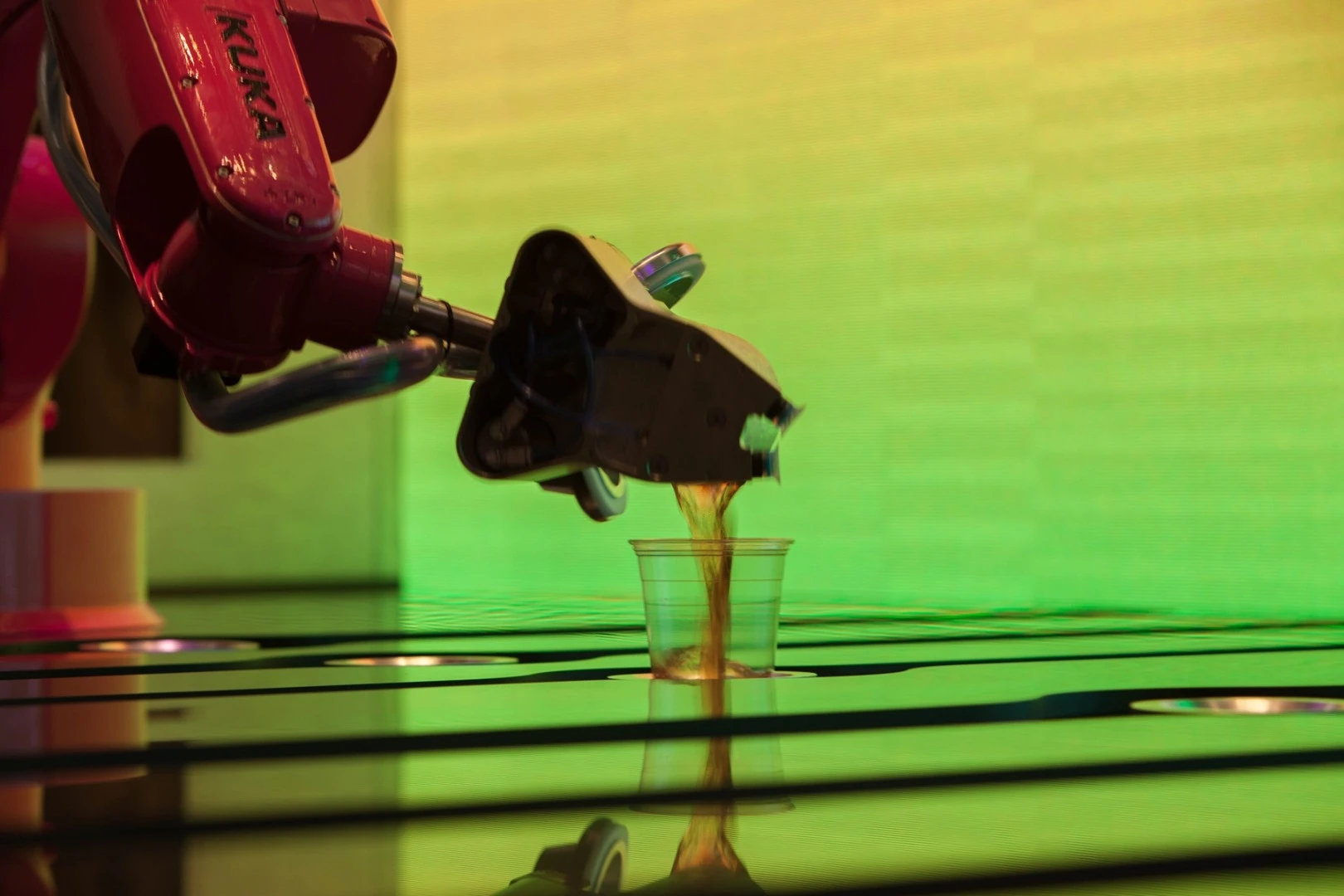 Once a robot has shaken a cocktail, it pours it into a glass