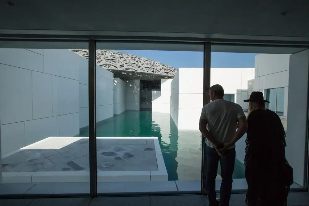 Visitors to the Louvre Abu Dhabi take a look outside