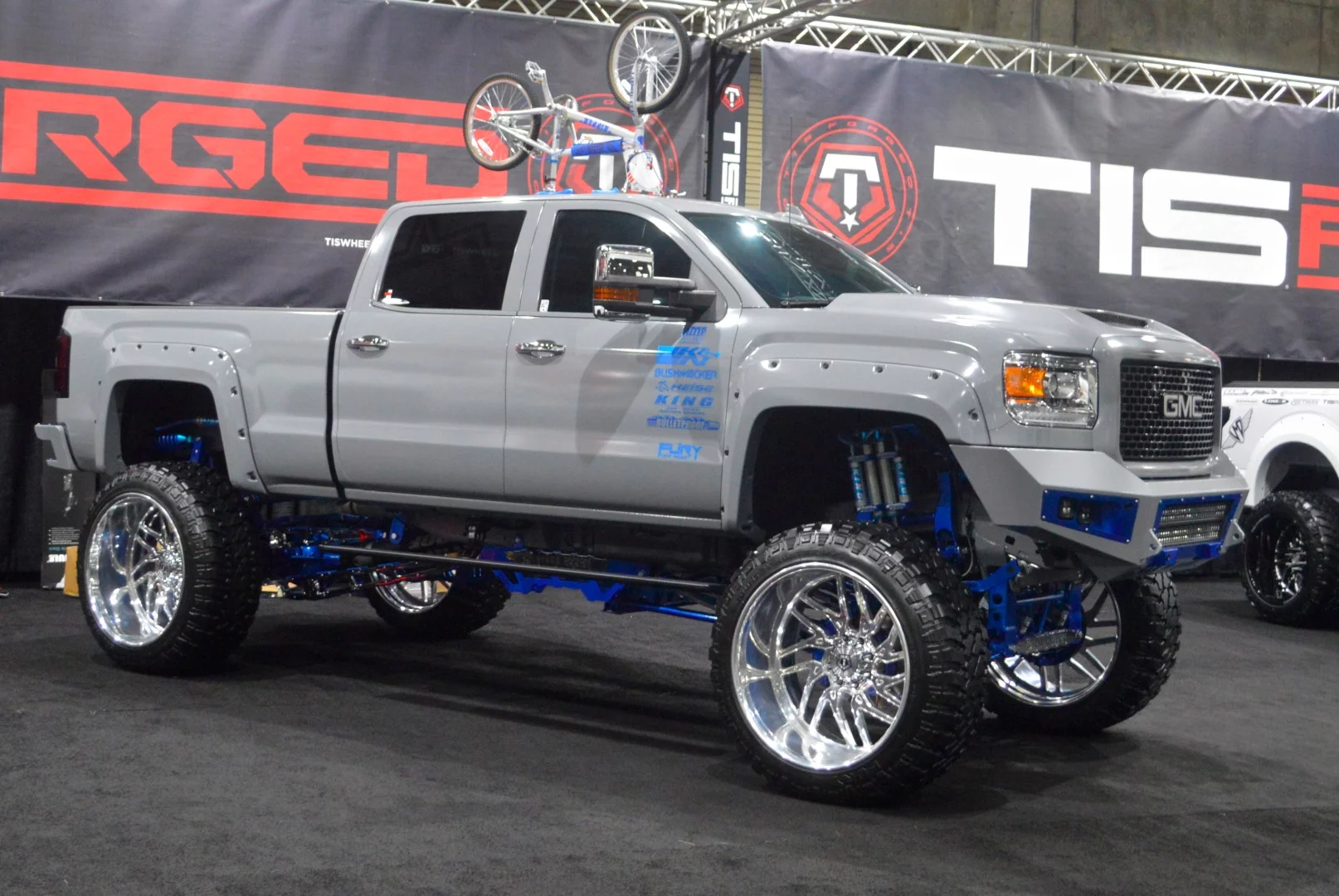 A tiny set of wheels atop a huge set of wheels