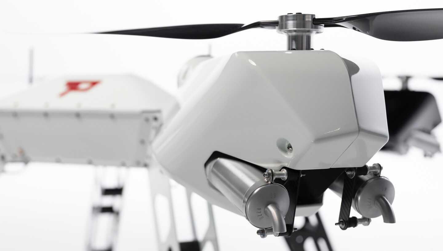 While a fuel tank feeds the gas engines, the Firefly drone's electric motors are powered by a 60V/5,000-mAh lithium battery