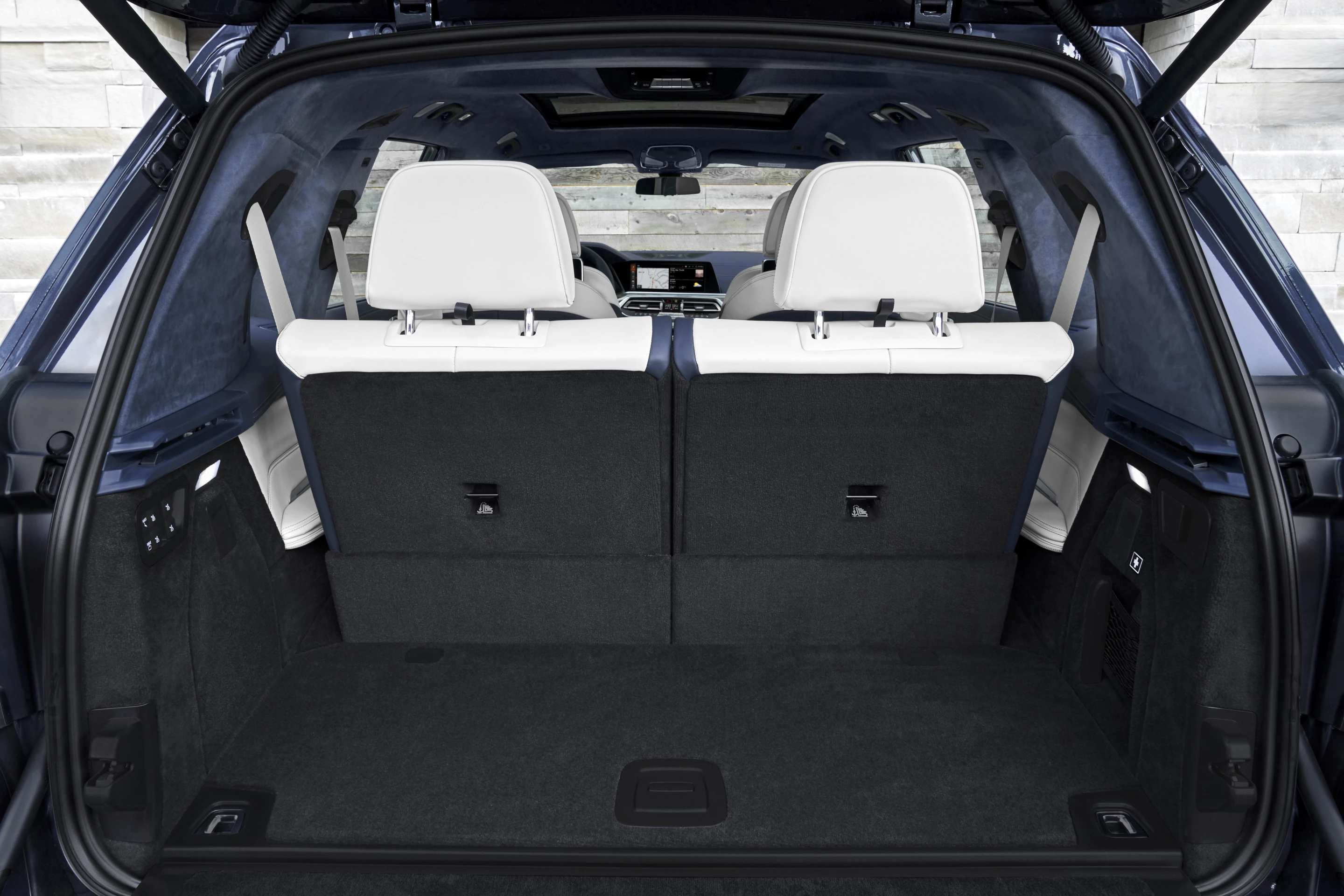 Like most large SUVs, cargo space behind the third row in the BMW X7 is limited, but not ti