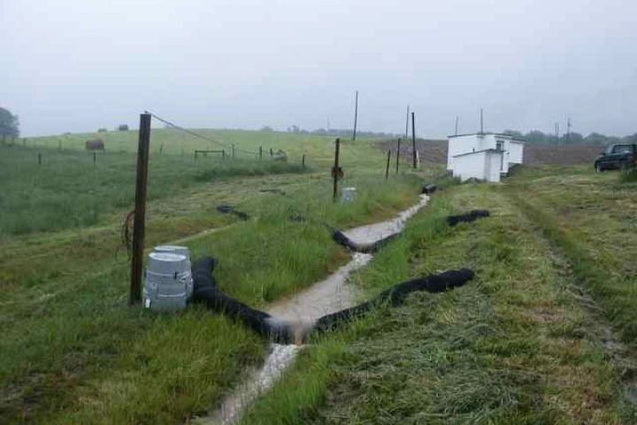 The compost filter socks in place, in a grassed waterway