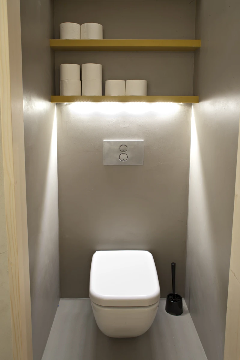 Despite its limited space, Freedom Room sports its own toilet cubicle