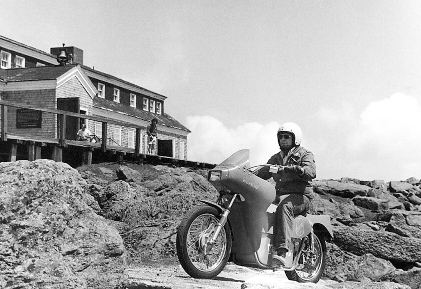 Corbin's electric street bike outside the Corbin factory in Connecticut, 1975