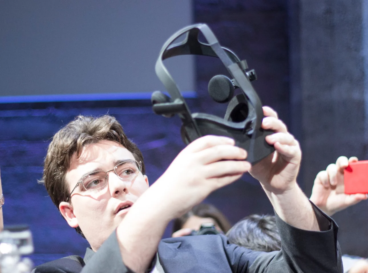 Luckey hoisting the product of his vision and fruit of his labors