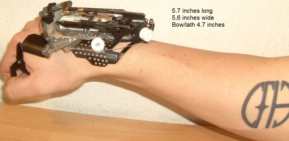 Hobbyist Patrick Priebe's latest creation is a wrist-mounted laser-sighted mini crossbow