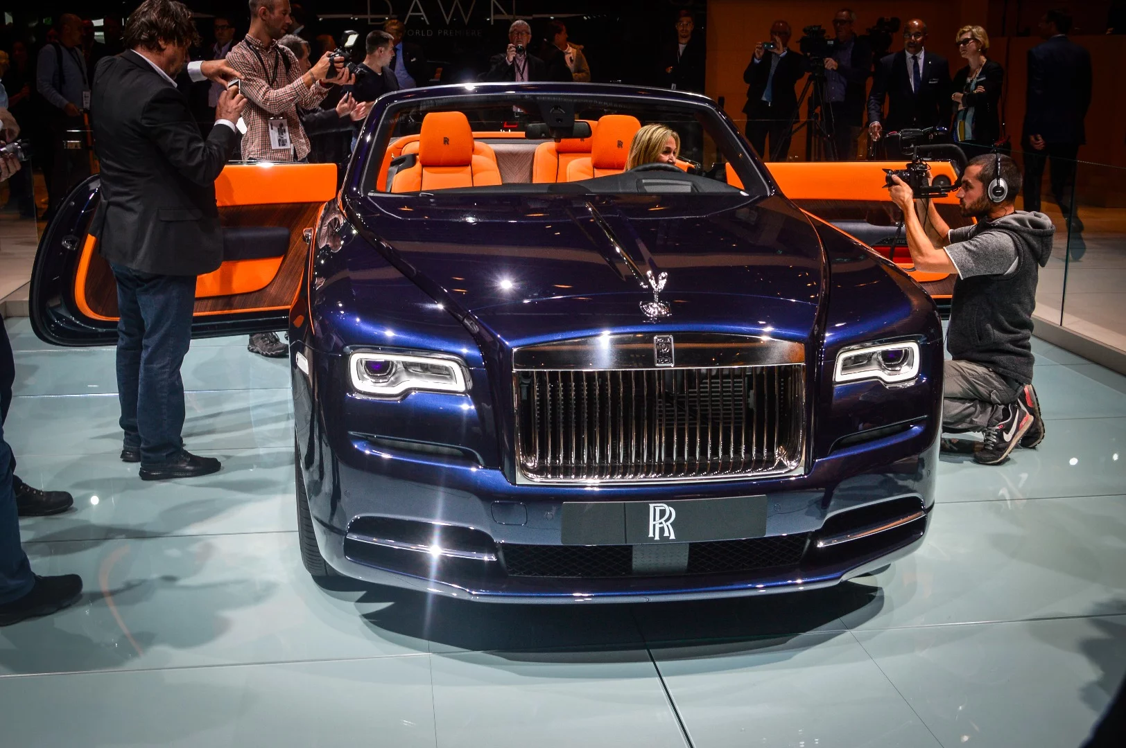 There's nothing subtle about this orange-interiored Rolls Royce Dawn