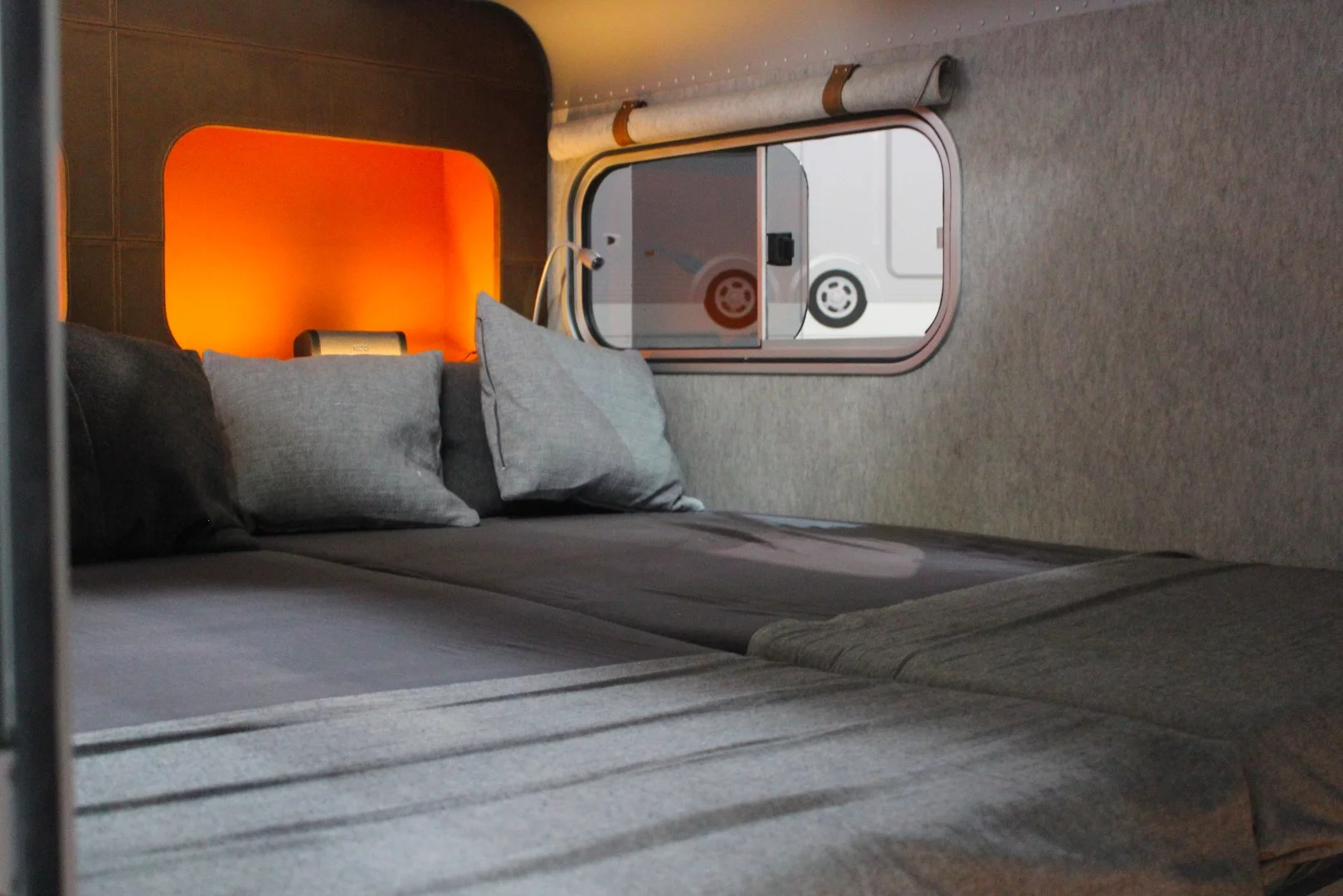 The Lume Traveler No. 1 features high-end touches like a leather rear wall, wool felt upholstery and teak flooring