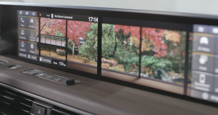 The two central screens are incredibly customizable – even down to a choice of wallpaper to personalize your dash