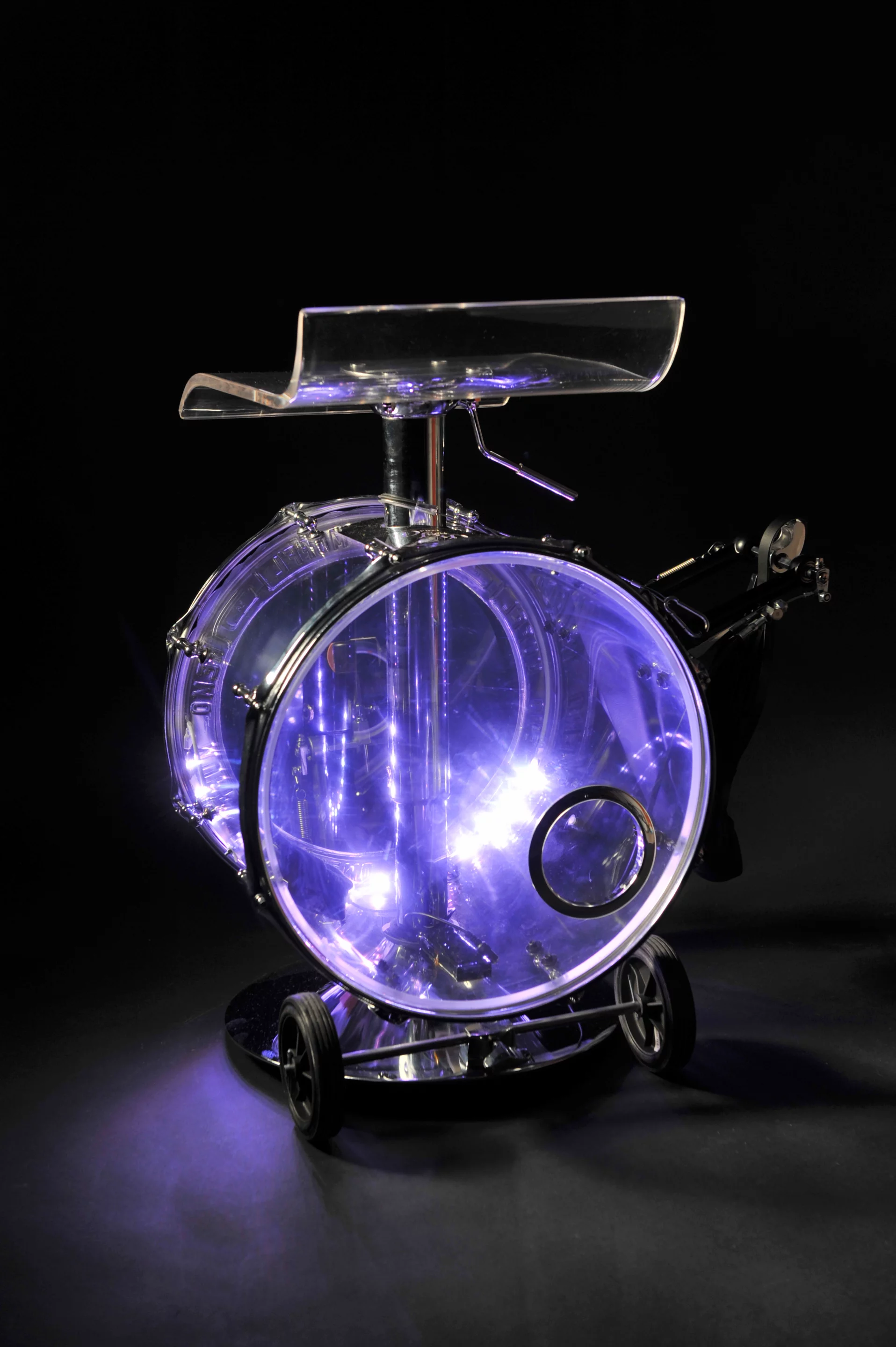 The acrylic Drumstooled has a battery-operated RGB LED lighting system built in to add a bit more magic to the performance