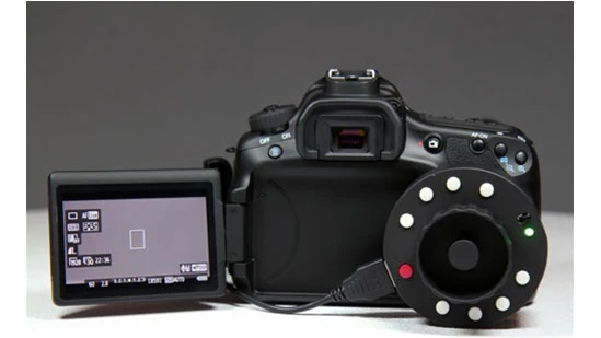 The Okii Systems USB Follow Focus works with many Canon EOS DSLRs (shown here with the EOS 60D)