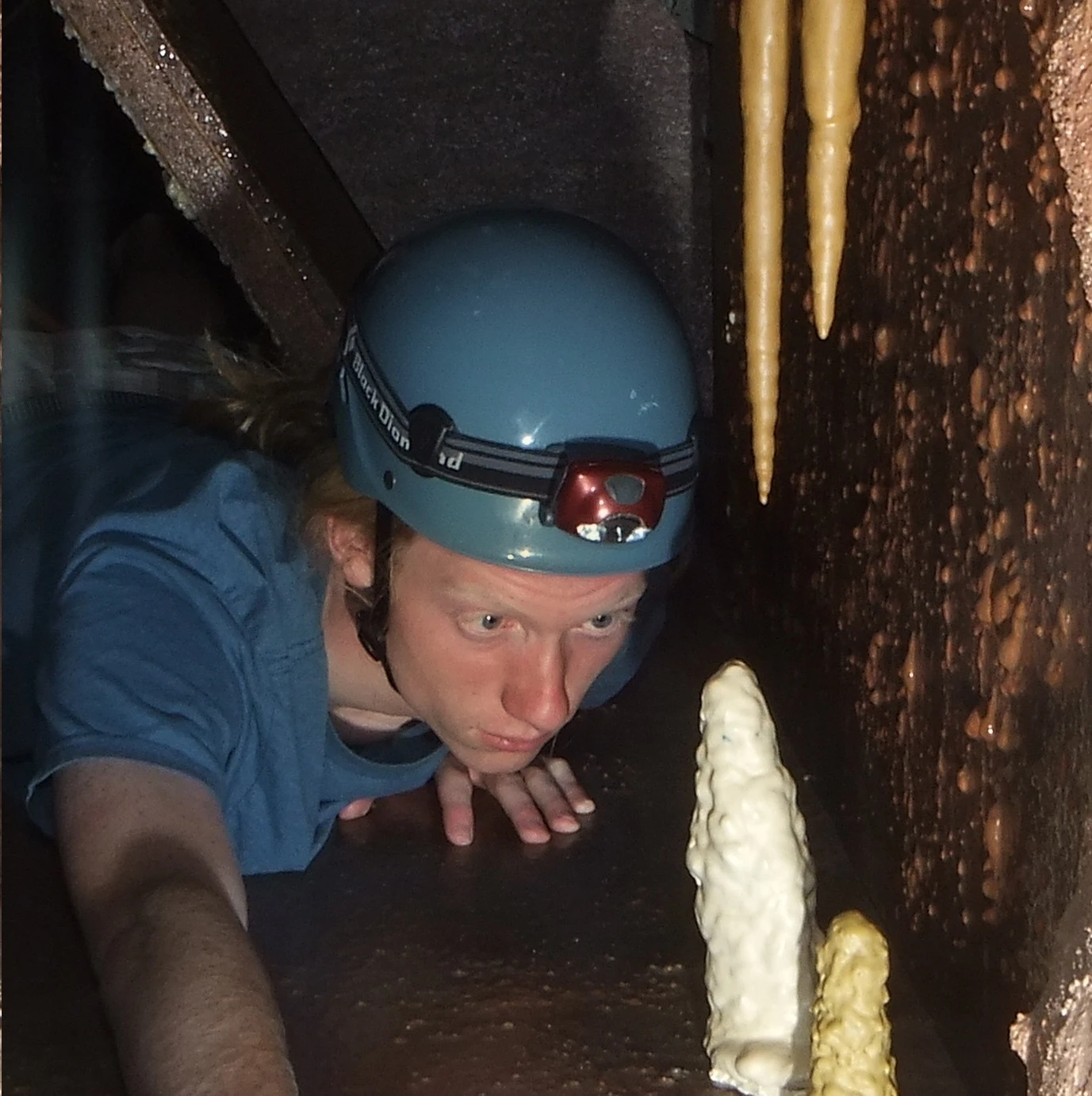 Carefully maneuver to avoid "breaking" fragile cave elements