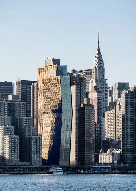 The American Copper Buildings are connected by a 100 ft (30 m)-long sky bridge at a height of 300 ft (91 m)
