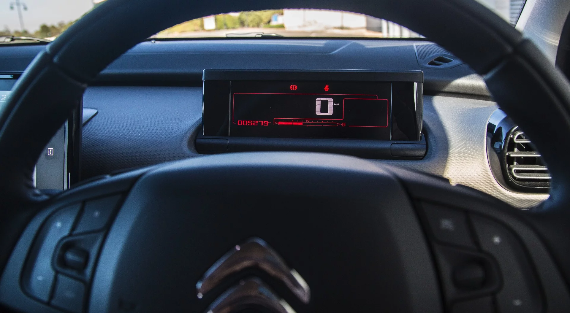 You don't get a rev counter in the Cactus, instead there's just a big speedo