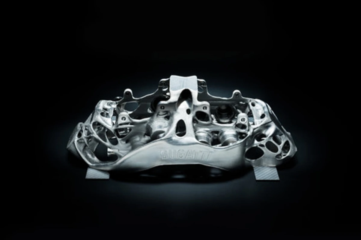This eight-piston monobloc brake caliper developed by Bugatti is the world’s first brake caliper to be produced by 3-D printer