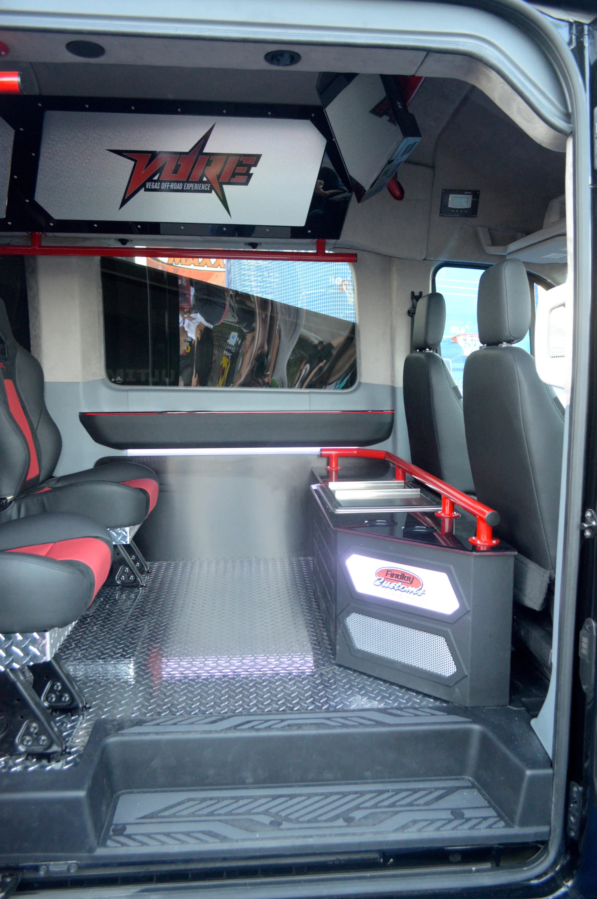 With its five exterior TVs, an inside 36-in Sony TV + PS4, and premium sound system, the VORE Transit is as much fun to hang out in as drive (Photo: C.C. Weiss/Gizmag)
