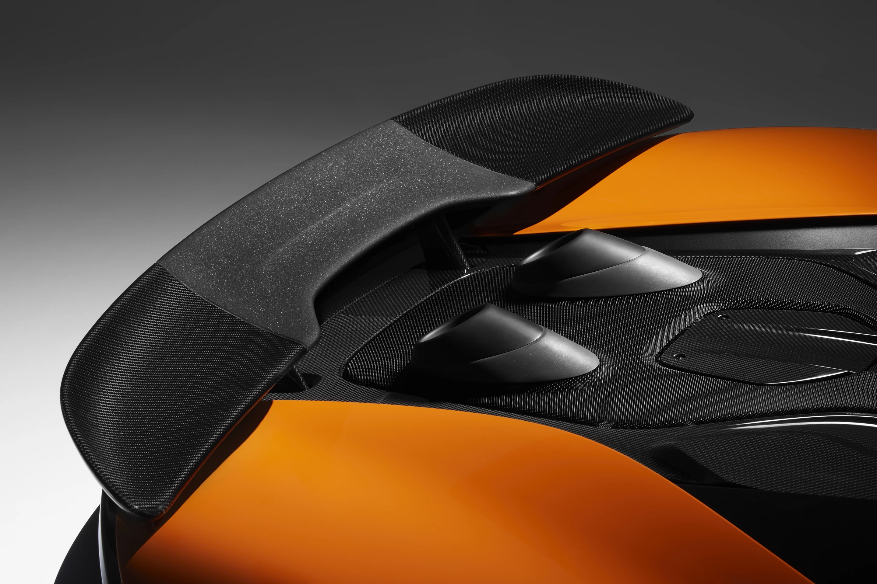 The "top-exit" exhaust on the McLaren 600LT flows just over the wing, aiding downforce at speed