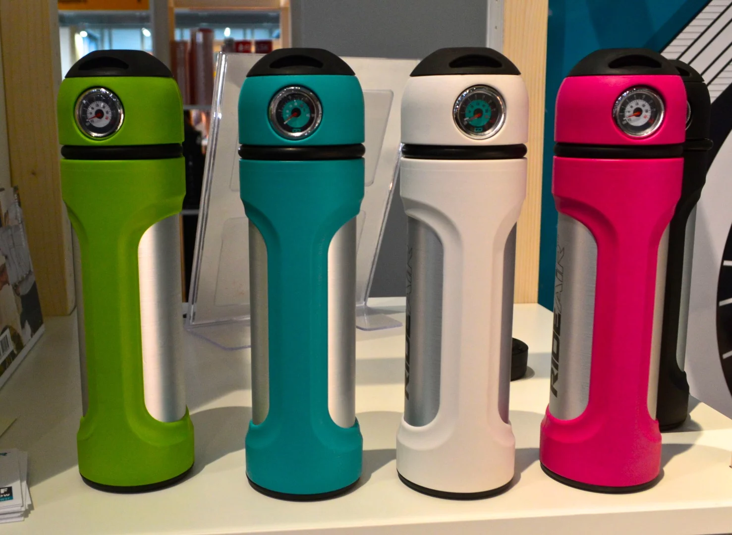 Refillable, water bottle-sized RideAir pumps provide a convenient portable bike pump