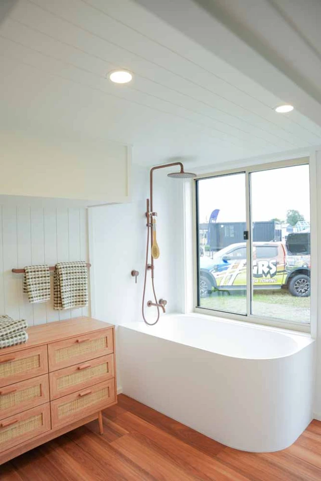 The Kookaburra 2.0's bathtub/shower is a rare luxury in a tiny house of this size