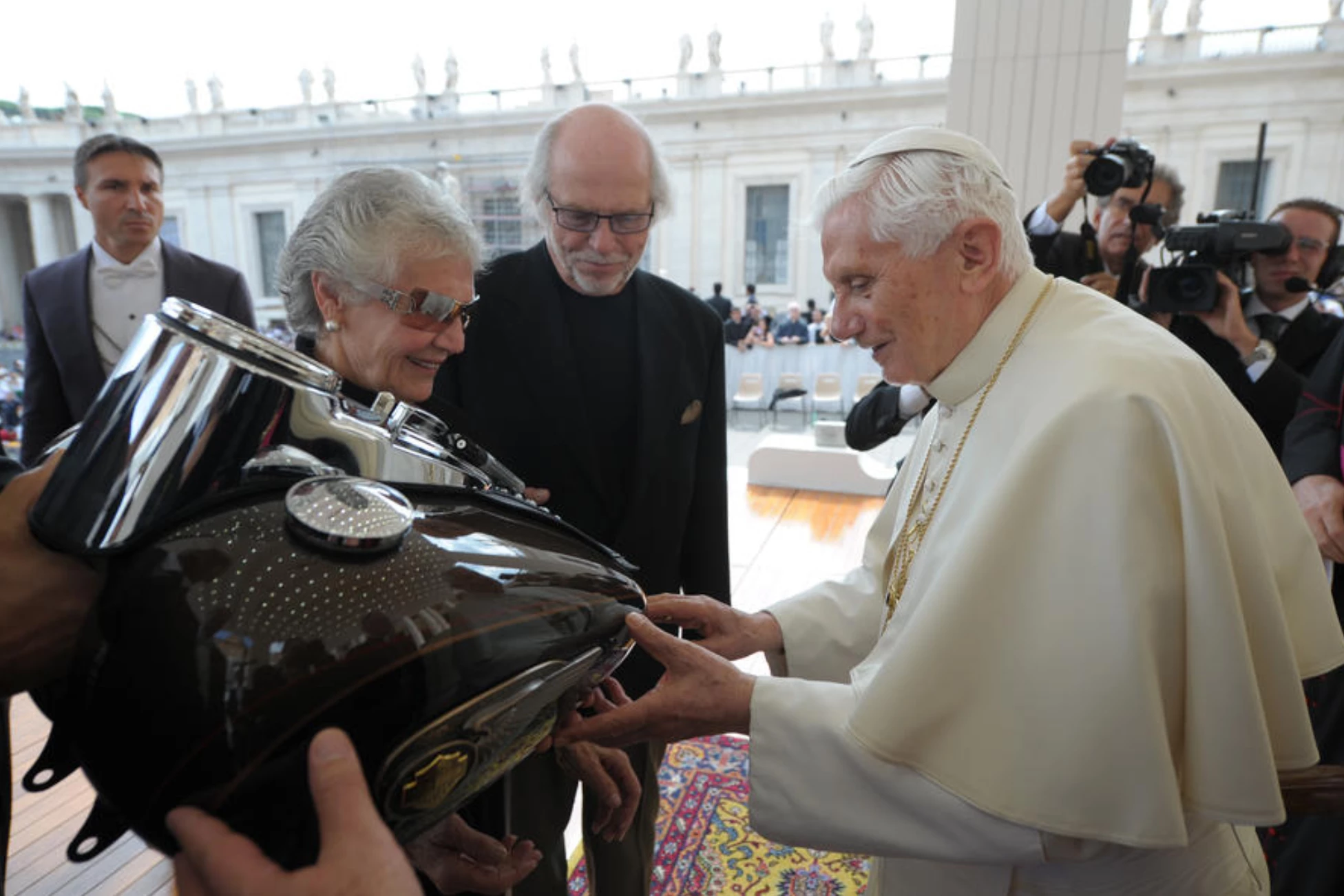 As part of Harley-Davidson's 110th anniversary celebrations, two commemorative motorcycle fuel tanks were presented to the then Pope, Benedict XVI
