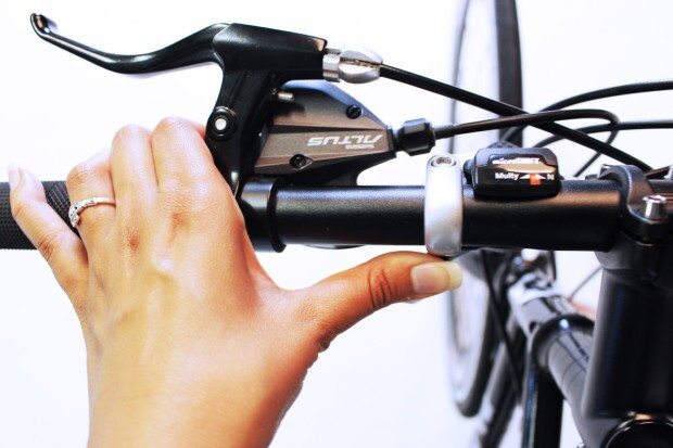 A bar-mounted thumb switch is used to select between the Caron Bicycle's different pedaling modes