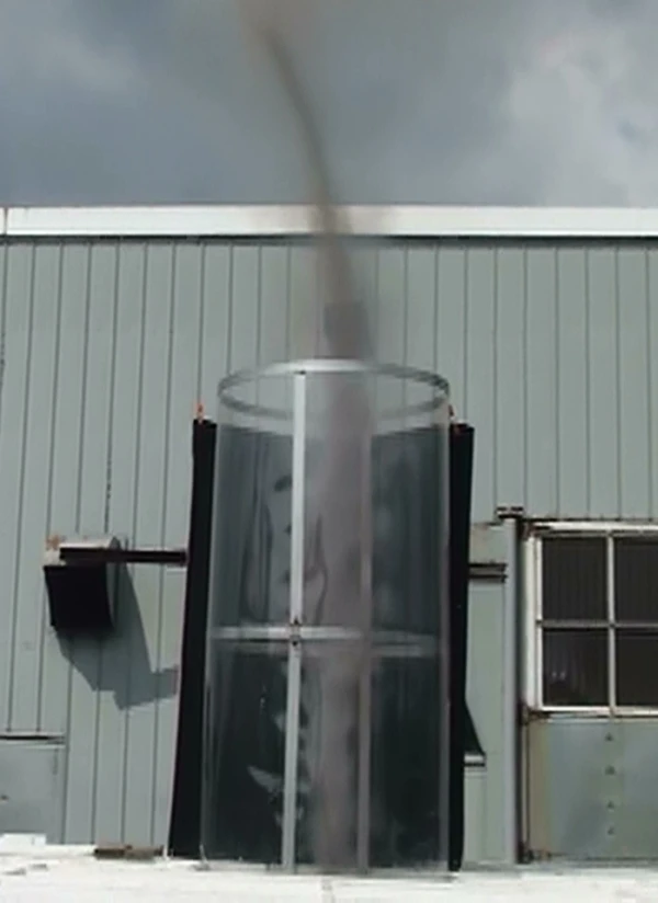 The heat required to get the mini-tornado started would initially be provided by a temporary heat source, such as a heater or steam