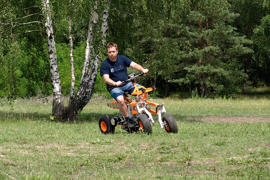 Each wheel of the EV4 off-road quad has hydraulic disk brakes for controlled stopping power