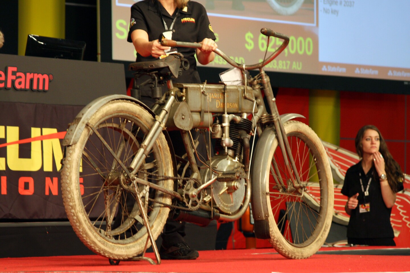 Dubbed the "Mona Lisa of Harley-Davidsons" by Mecum MidAmerica's independent on-stage vintage bike authority Paul D'Orleans, the incredibly original 1907 Strap Tank set a new record for both the marque and the model.